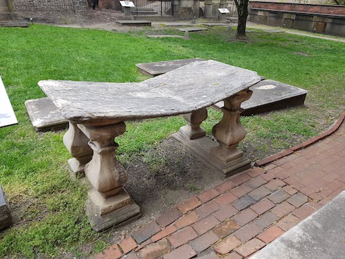 Partially broken stone table